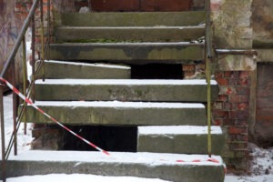 Damaged stairs that could result in an accident. You can contact a Montgomery premises liability lawyer after an injury.