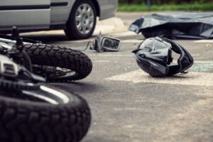 A motorcycle accident crash scene. A Eutaw motorcycle accident lawyer may be able to help you to maximize compensation for your injuries and other damages.