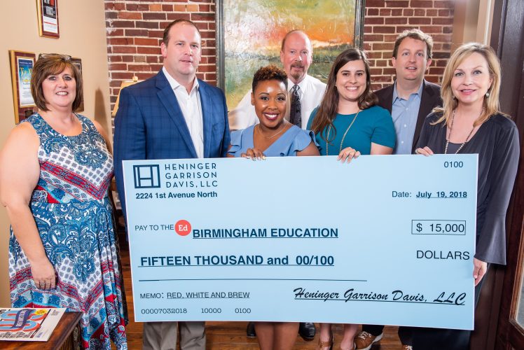 HGD team presents $15,000 check to Birmingham Education Foundation.  L-R:  Cheryl Thomas, Erik Heninger, KC Dada, Steve Heninger, Whitney Williams, JW Carpenter and Tzena Gauldin
